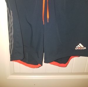 ADIDAS grey and orange running shorts size M Zipper pocket